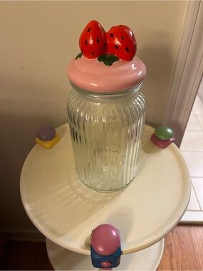 Clear strawberry lidded jar